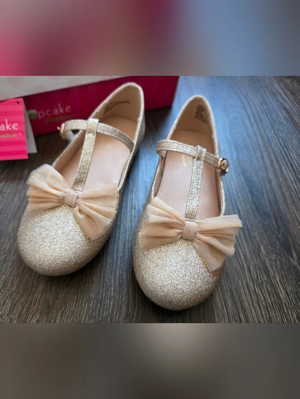 Cupcake Couture gold shimmer bow t-strap flats